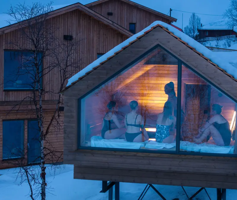 Friends enjoying a sauna at Filefjellstuene on a winter day