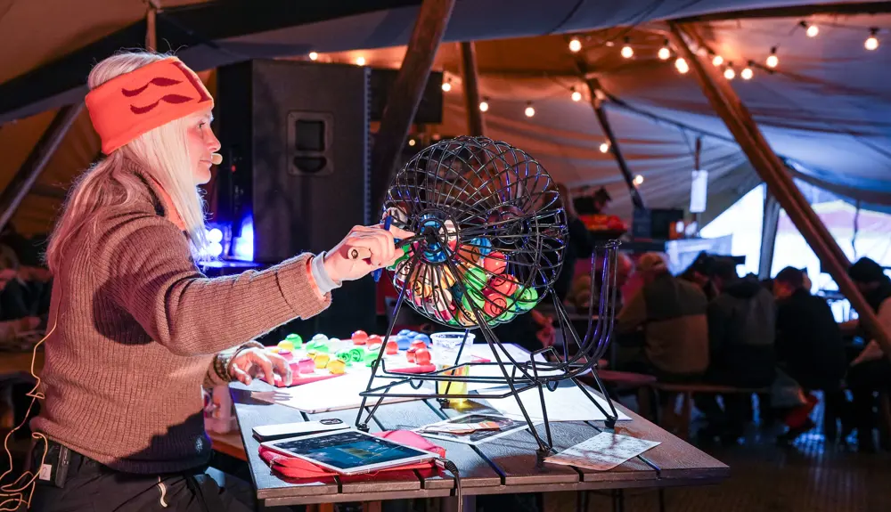 Marianne Riste organizes Mountain Bingo. 