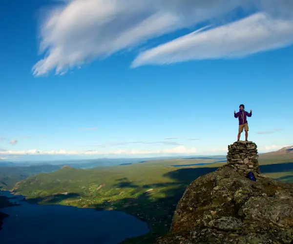 Hiker at the top of Uksestigen in Vang
