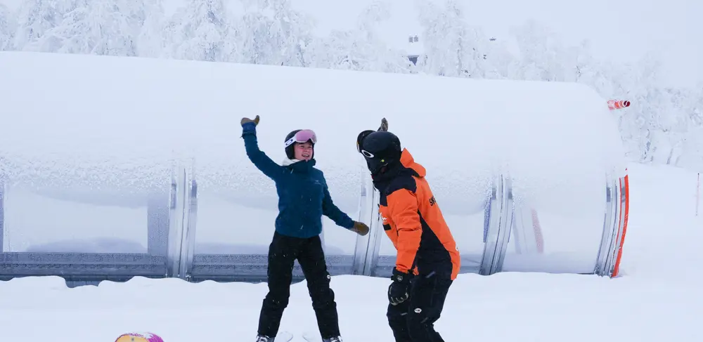 Student and teacher at ski school in Tyin Filefjell Ski Center