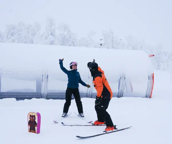 Student and teacher at ski school in Tyin Filefjell Ski Center